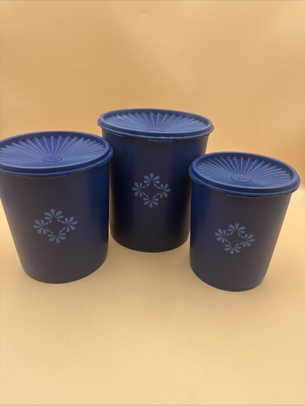 Vintage Tupperware 3 Canister Set Dark Blue w/ Floral Motif Sunburst Lids BIN 48